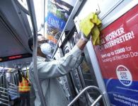 Man cleaning bus during COVID-19 crisis