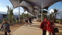 People walking in and out of the climate talks in Marrakech